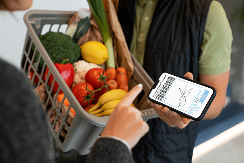 delivery-man-giving-groceries-order-customer1
